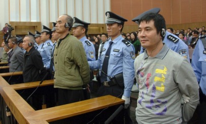 Suspects listen to their verdicts at a court in Kunming, Yunnan province, November 6, 2012. Photo source (Reuters) 