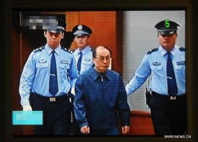 Video grab shows China's former railways minister Liu Zhijun being brought into the Beijing Second Intermediate People's Court in Beijing, capital of China, June 9, 2013. Liu stood trial in the court on Sunday on charges of bribery and abuse of power. Source - Xinhua, by Gong Lei) 