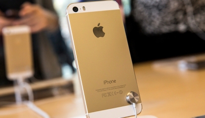 The gold version of the iPhone 5S is displayed at an Apple store on September 20, 2013 in New York City. Photograph by Andrew Burton/Getty Images 